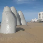 La Mano sculpture rising from the sand at Playa Brava in Punta del Este