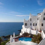 Casapueblo's terraced exterior overlooking Punta Ballena's bay