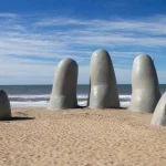 La Mano sculpture emerging from the sand on Playa Brava in Punta del Este
