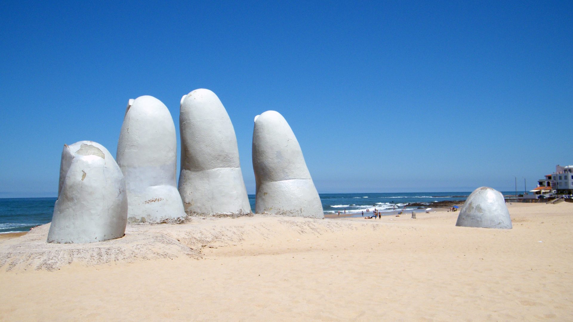 Real photograph of La Mano sculpture on Playa Brava in Punta del Este