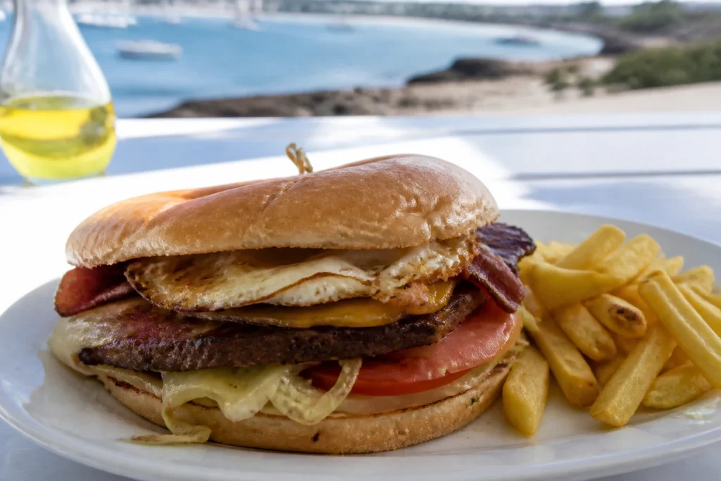 Uruguayan chivito served for a coastal meal in Punta del Este