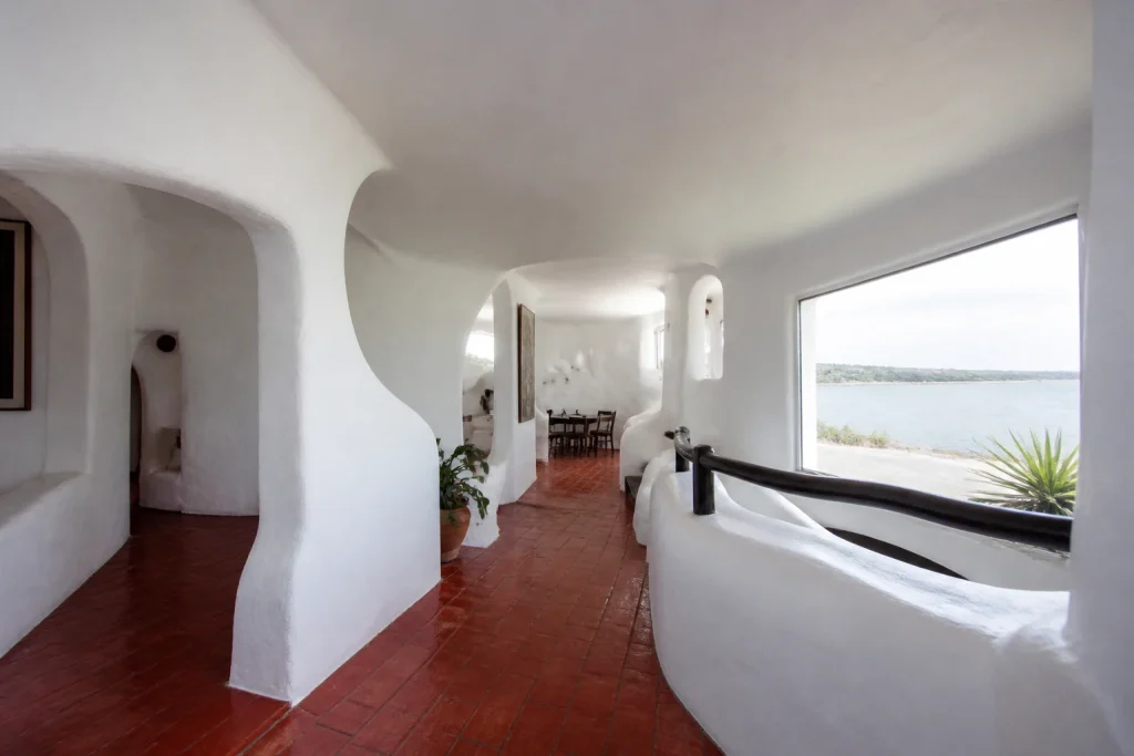 Curved white interior passage at Casapueblo