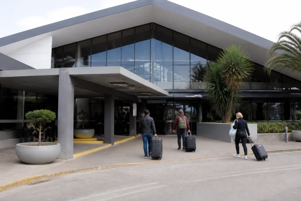 Travelers outside Punta del Este Bus Terminal