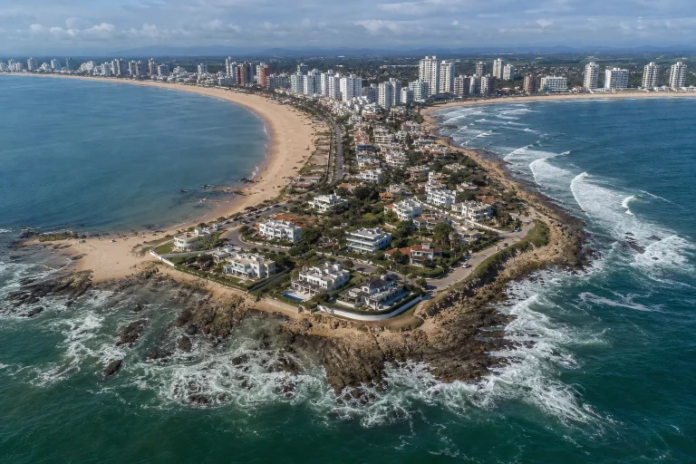 Aerial coastal view of the Punta del Este Peninsula between Playa Mansa and Playa Brava.