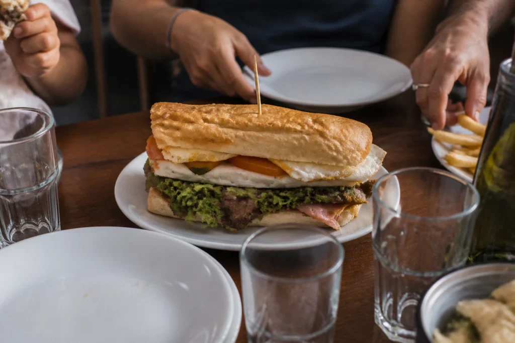 Uruguayan chivito served during a family meal in Punta del Este