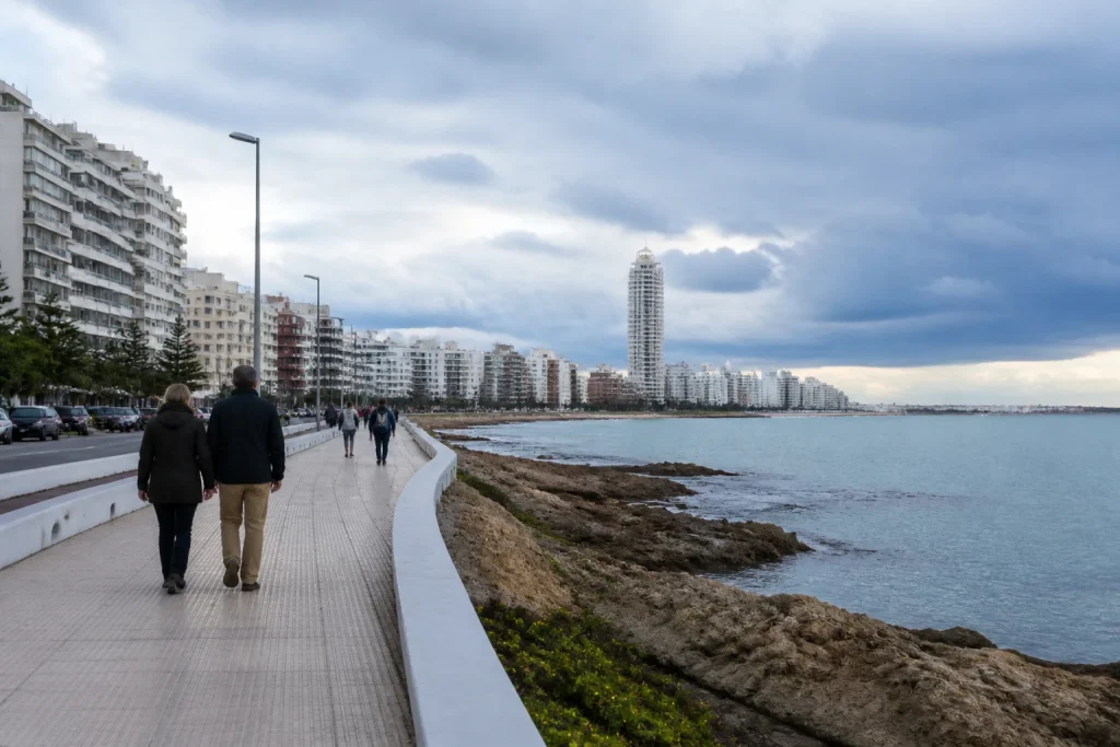 Layered clothing on a cool day along the Punta del Este seafront