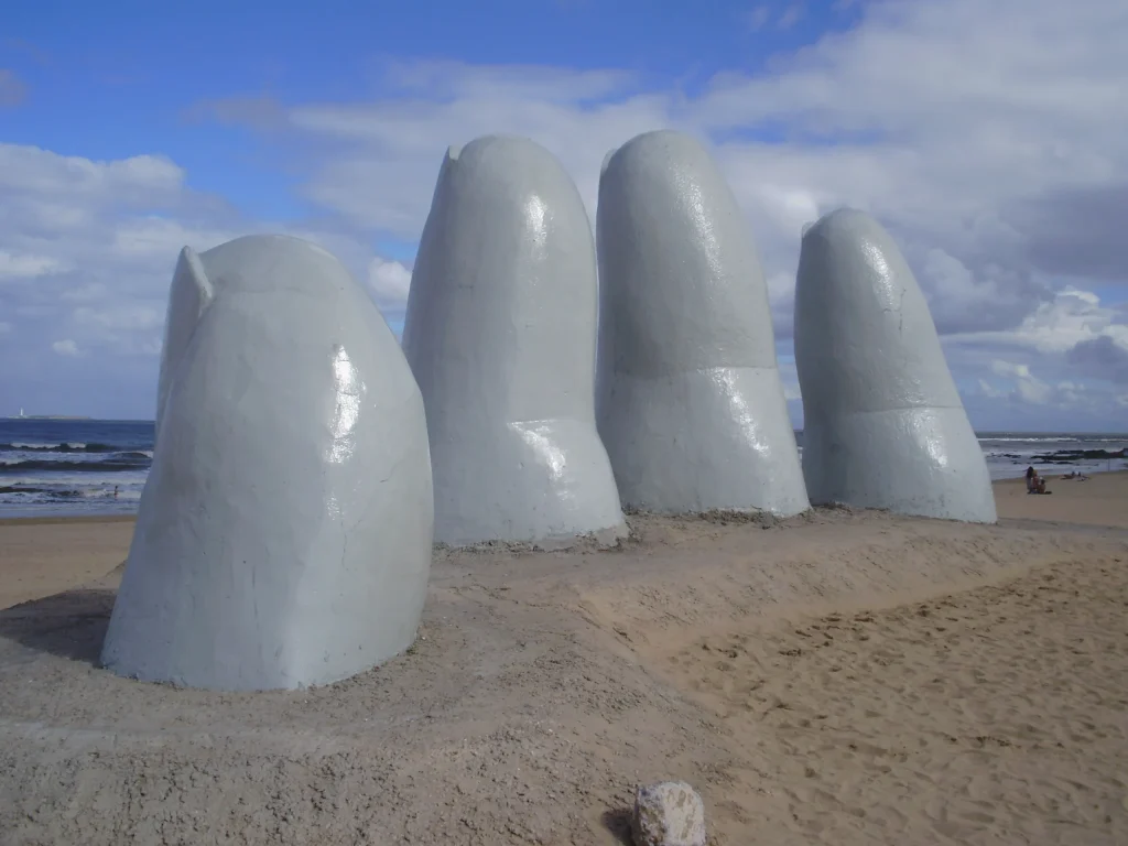La Mano hand sculpture on the beach in Punta del Este